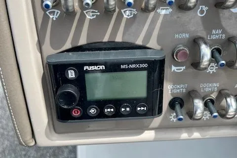 Slide: The Image of Control panel of a 2011 Sea Ray 250 SLX with Fusion MS-NRX300 stereo system. - 3