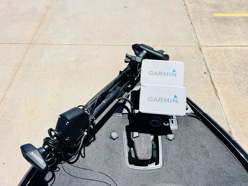 Slide: The Image of 2024 Ranger Z520R boat with Garmin electronics and Minn Kota trolling motor on deck. - 13