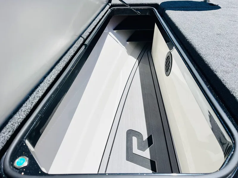 Slide: The Image of 2024 Ranger Z520R Ranger Cup Equipped storage compartment with sleek interior design. - 19