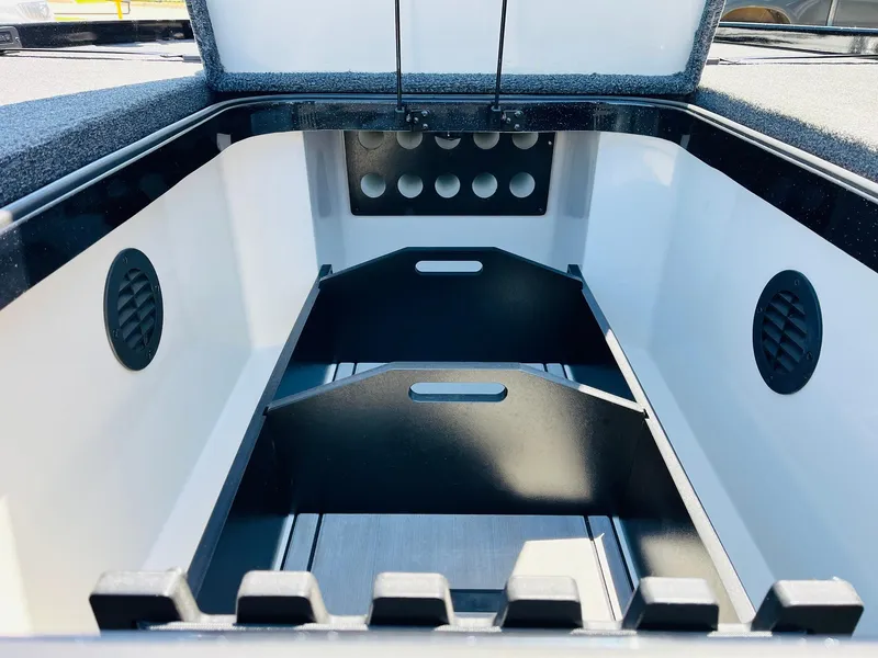 Slide: The Image of 2024 Ranger Z520R Ranger Cup Equipped storage compartment, featuring organized interior with dividers. - 21