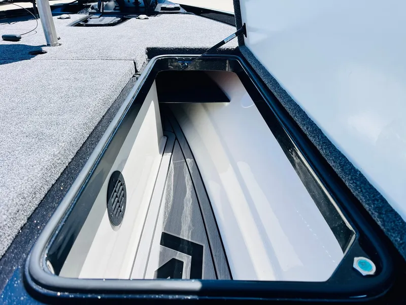 Slide: The Image of 2024 Ranger Z520R Ranger Cup Equipped boat storage compartment, open and empty. - 23