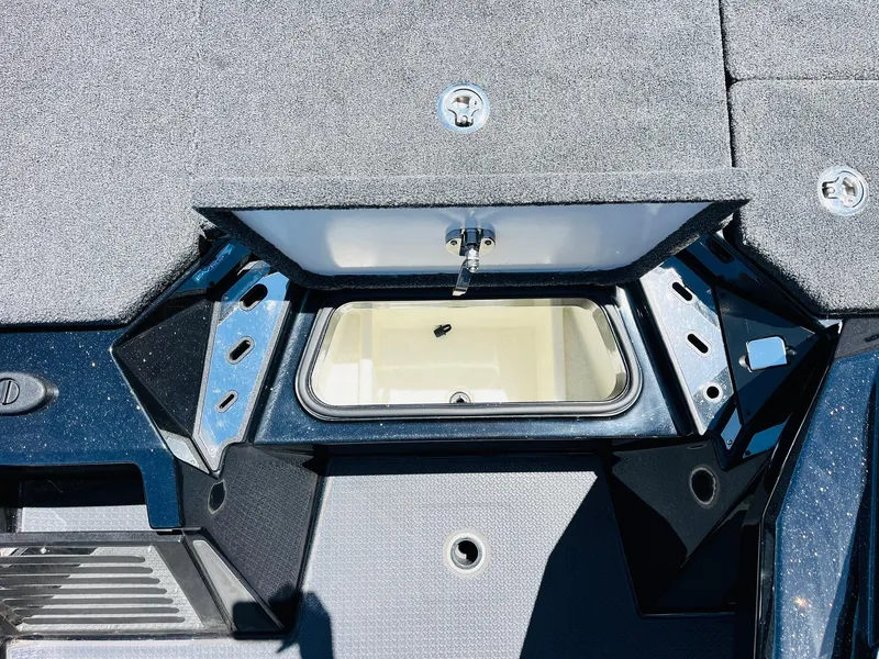 Slide: The Image of 2024 Ranger Z520R Ranger Cup Equipped boat storage compartment, open lid, interior view. - 28