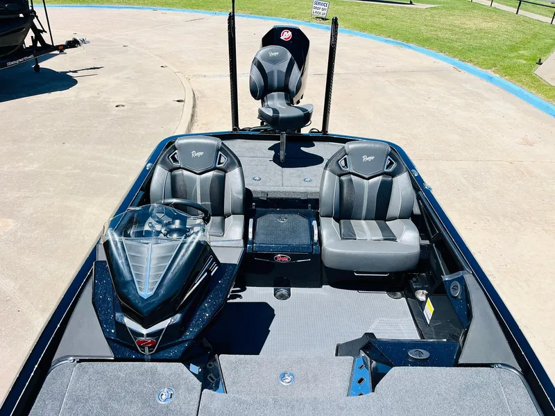 Slide: The Image of 2024 Ranger Z520R Ranger Cup Equipped boat interior with seating and console. - 29