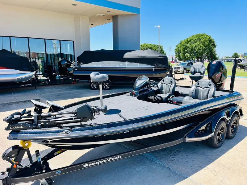Slide: The Image of 2024 Ranger Z520R Ranger Cup Equipped boat displayed outdoors on a sunny day. - 3