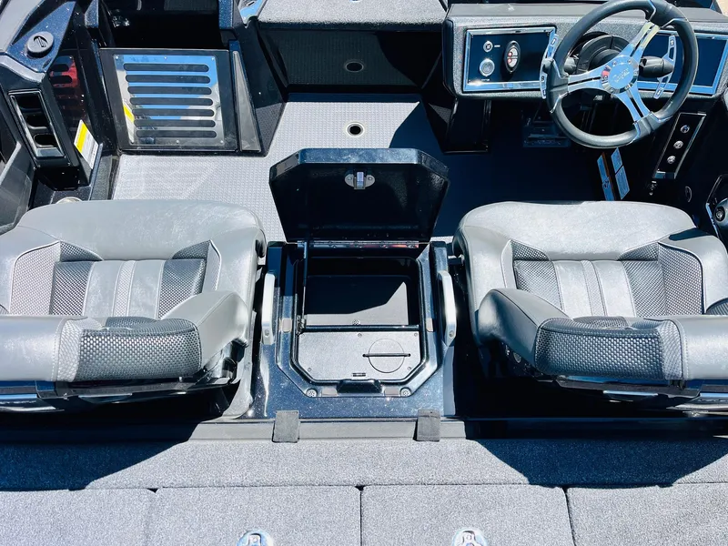 Slide: The Image of 2024 Ranger Z520R Ranger Cup boat interior with dual seats and steering wheel. - 31