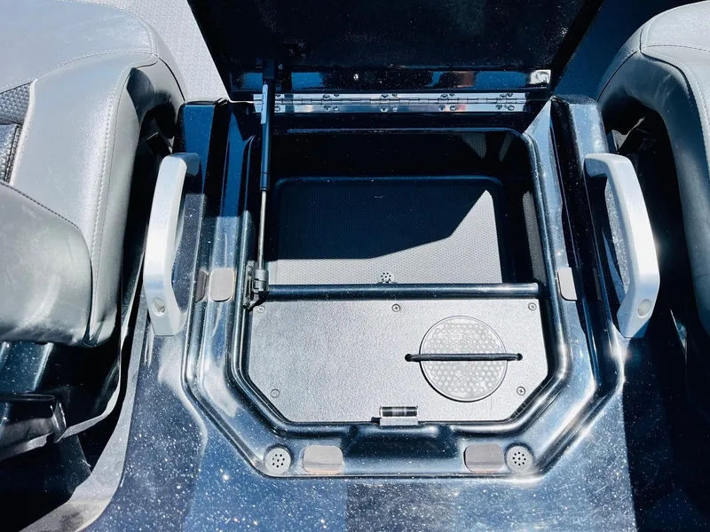 Slide: The Image of 2024 Ranger Z520R Ranger Cup Equipped storage compartment with open lid and handles. - 32