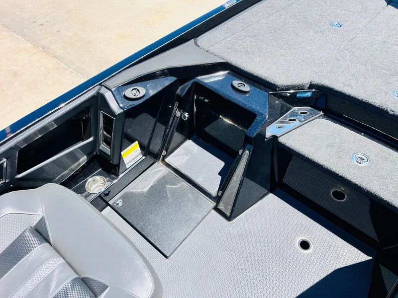 Slide: The Image of 2024 Ranger Z520R Ranger Cup Equipped boat interior, featuring seating and storage compartments. - 35