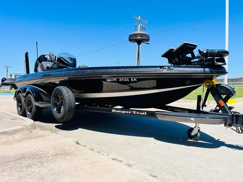 Slide: The Image of 2024 Ranger Z520R Ranger Cup Equipped boat on trailer, parked outdoors. - 4
