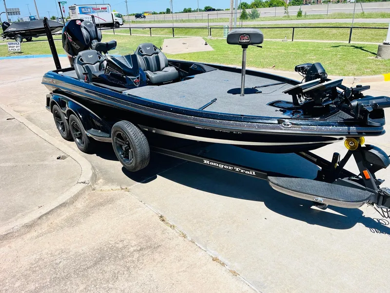 Slide: The Image of 2024 Ranger Z520R Ranger Cup Equipped boat on trailer, parked outdoors. - 5