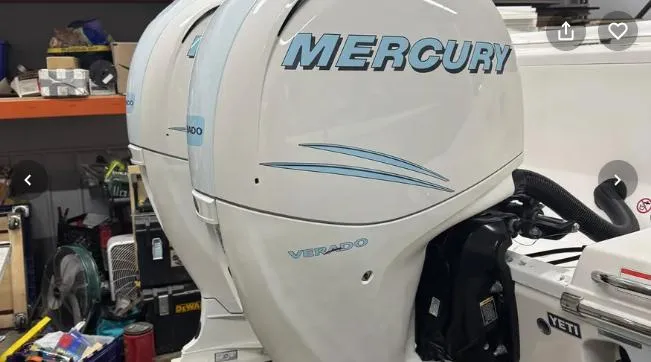 Slide: The Image of Twin Mercury Verado outboard engines on a 2018 Robalo R242 Explorer boat. - 18