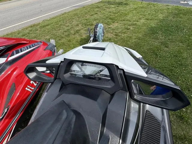 Slide: The Image of 2018 Yamaha WaveRunner VX Cruiser HO parked on grass, showcasing sleek design and handlebars. - 3