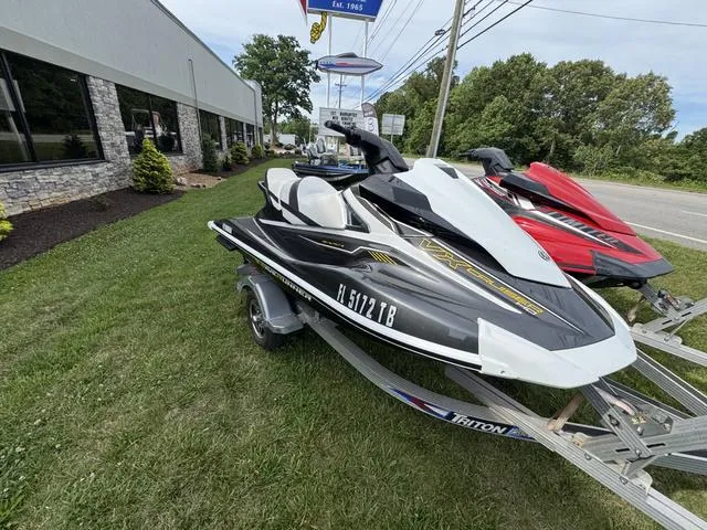 Slide: The Image of 2018 Yamaha WaveRunner VX Cruiser HO on trailer, parked on grass near dealership. - 5