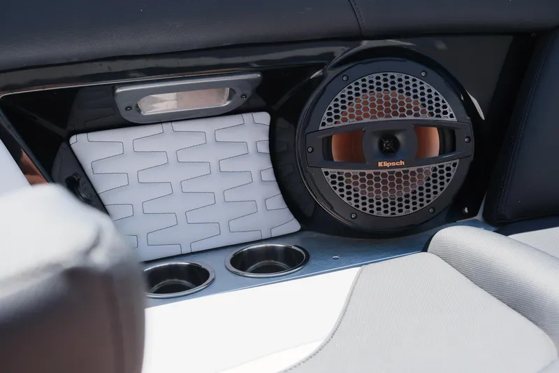 Slide: The Image of 2023 MasterCraft X24 interior with Klipsch speaker and cup holders. - 34