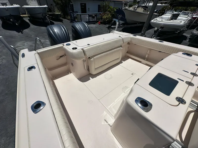 Slide: The Image of 2013 Grady-White Canyon 306 boat interior with spacious deck and seating area. - 36