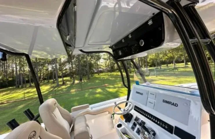 Slide: The Image of Interior view of 2020 Key West 263 FS boat with Simrad electronics. - 11