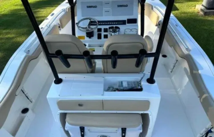 Slide: The Image of 2020 Key West 263 FS boat interior with dual seats and control panel. - 6