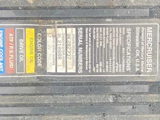 Slide: The Image of Sticker displaying MerCruiser specifications and serial numbers for a 1998 Bayliner Ciara 2855 boat. - 18
