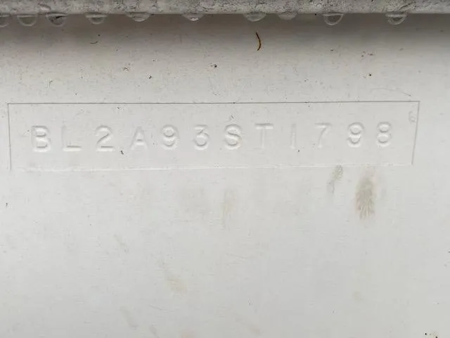 Slide: The Image of 1998 Bayliner Ciara 2855 hull identification number embossed on white surface. - 6