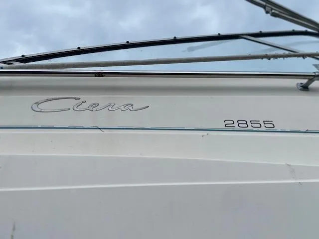 Slide: The Image of 1998 Bayliner Ciera 2855 boat exterior with model name and number. - 7