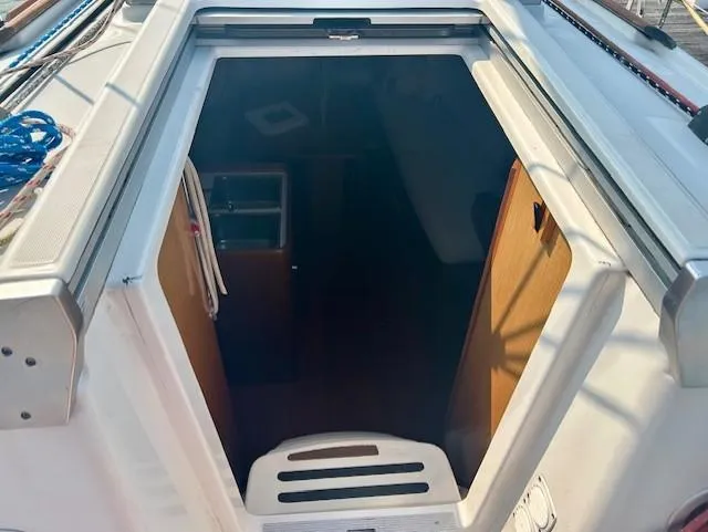 Slide: The Image of Entrance to cabin of 2008 Beneteau Oceanis 31 sailboat, showing interior access. - 11