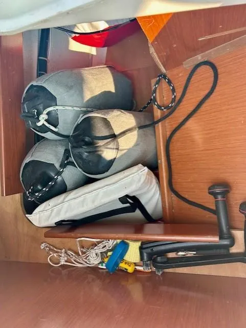 Slide: The Image of Storage area on a 2008 Beneteau Oceanis 31 sailboat with fenders and ropes. - 18