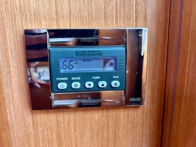 Slide: The Image of Thermostat control panel on 2008 Beneteau Oceanis 31 yacht interior. - 28