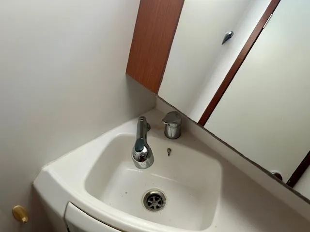 Slide: The Image of Sink area in 2008 Beneteau Oceanis 31 yacht bathroom. - 33