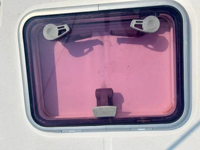 Slide: The Image of Hatch window of a 2008 Beneteau Oceanis 31 sailboat. - 5