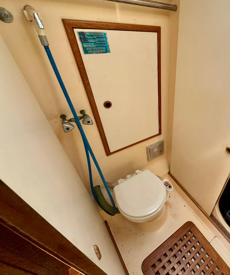 Slide: The Image of Control panel of a 1984 Camper & Nicholsons Nicholson 35 yacht, featuring various switches and gauges. - 17