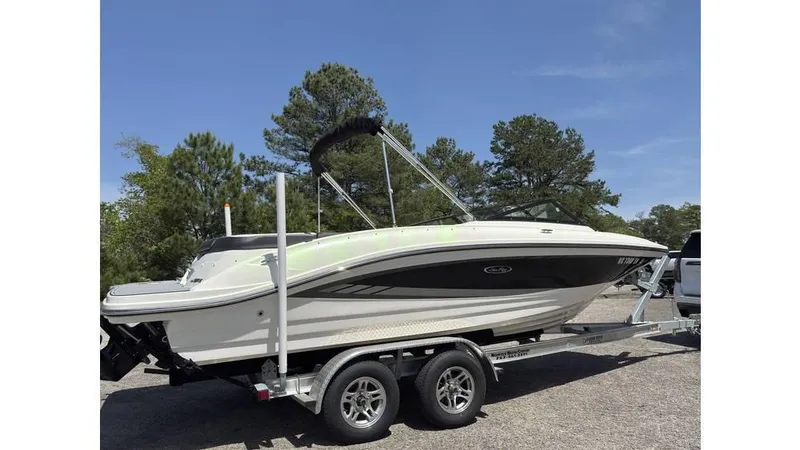 Slide: The Image of 2016 Sea Ray SPX 210 boat on trailer, parked outdoors. - 3