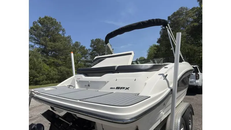 Slide: The Image of 2016 Sea Ray SPX 210 boat on trailer, parked outdoors, rear view. - 4