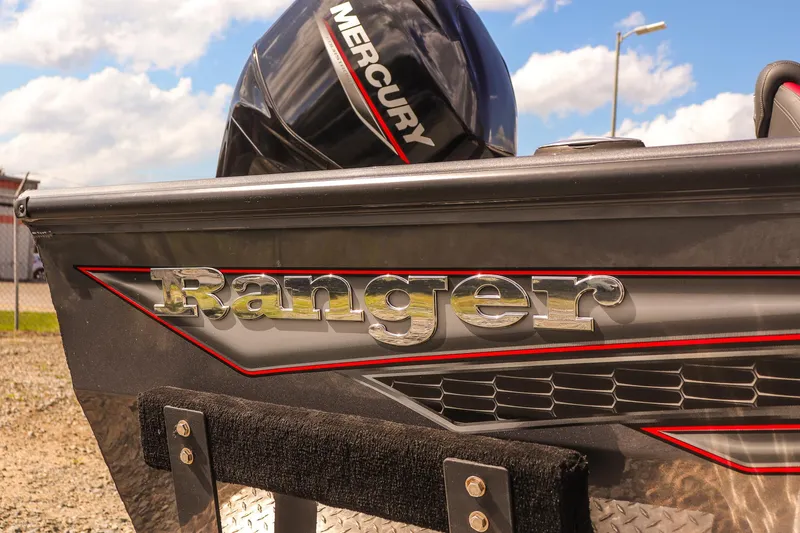 Slide: The Image of Ranger VS1660 SC 2020 boat with Mercury engine, close-up of branding and design details. - 11