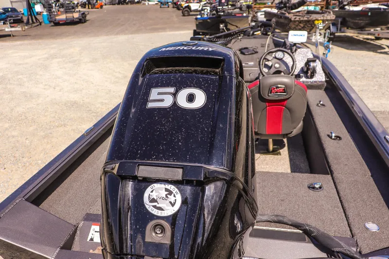 Slide: The Image of 2020 Ranger VS1660 SC boat with Mercury 50 engine, featuring a sleek interior design. - 16