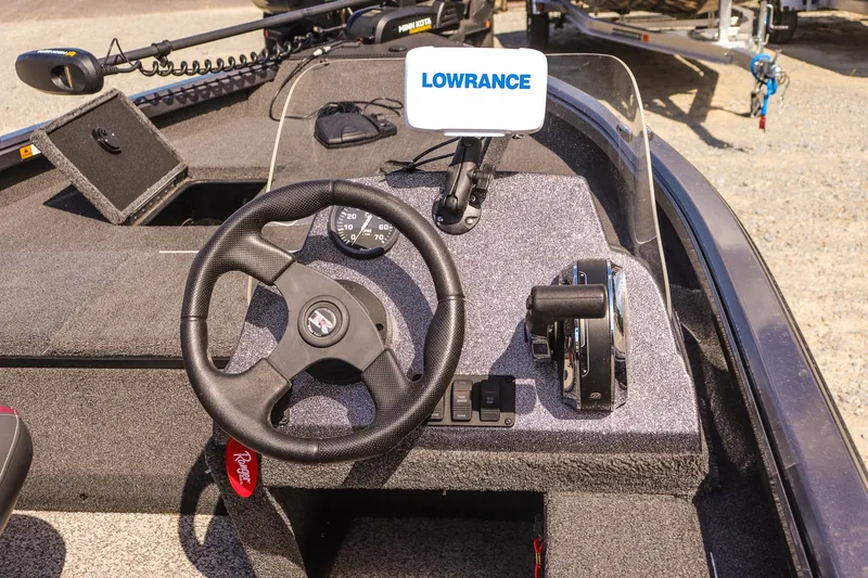 Slide: The Image of 2020 Ranger VS1660 SC boat dashboard with steering wheel and Lowrance display. - 18