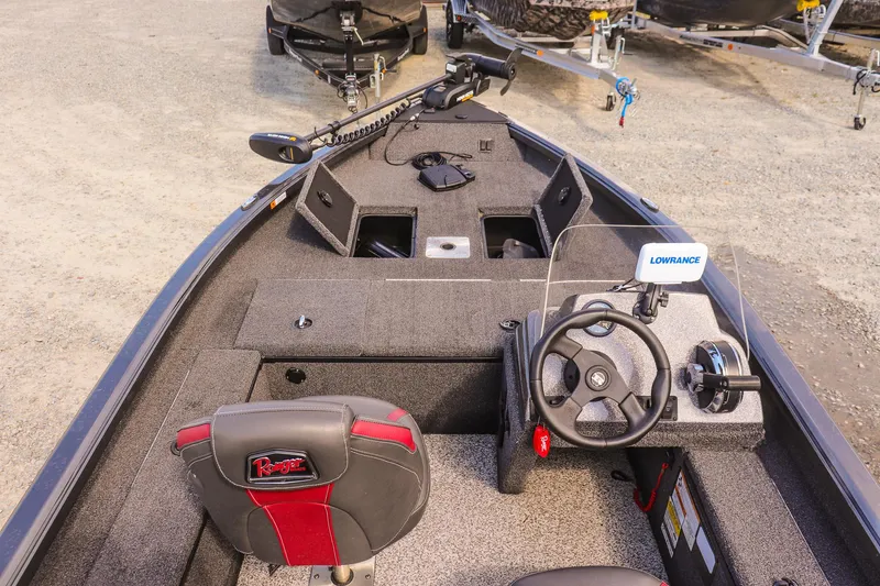 Slide: The Image of 2020 Ranger VS1660 SC fishing boat interior with steering wheel and seating. - 22