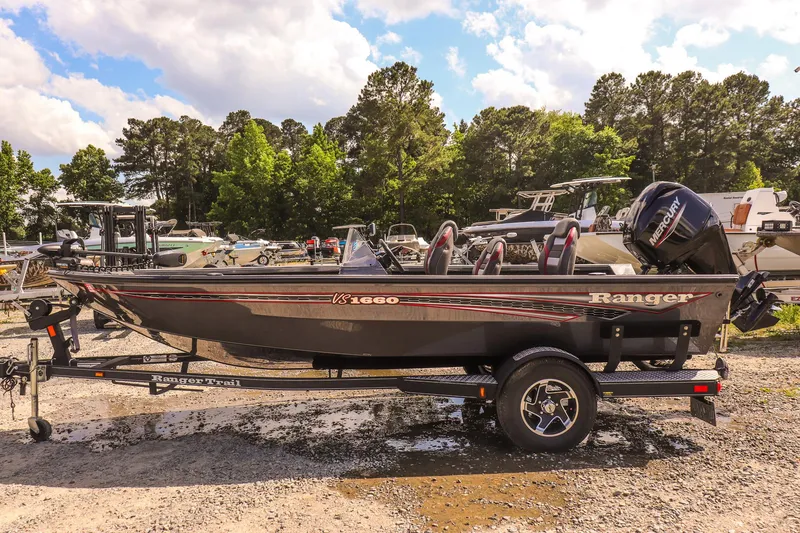 Slide: The Image of 2020 Ranger VS1660 SC fishing boat on trailer, parked outdoors. - 5