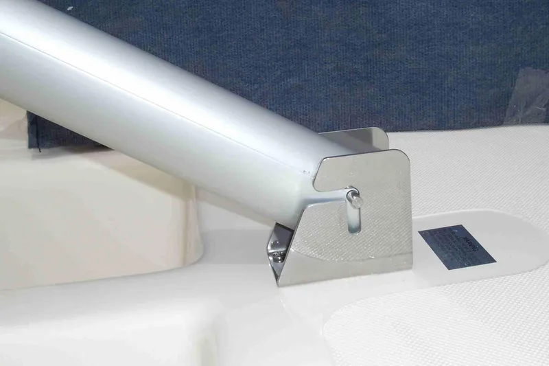 Slide: The Image of American Sail AMERICAN 14.6, 2025 model, mast base detail on sailboat deck. - 10