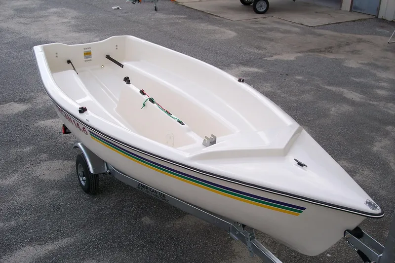 Slide: The Image of 2025 American Sail AMERICAN 14.6 sailboat on trailer, white hull with colorful stripe. - 6