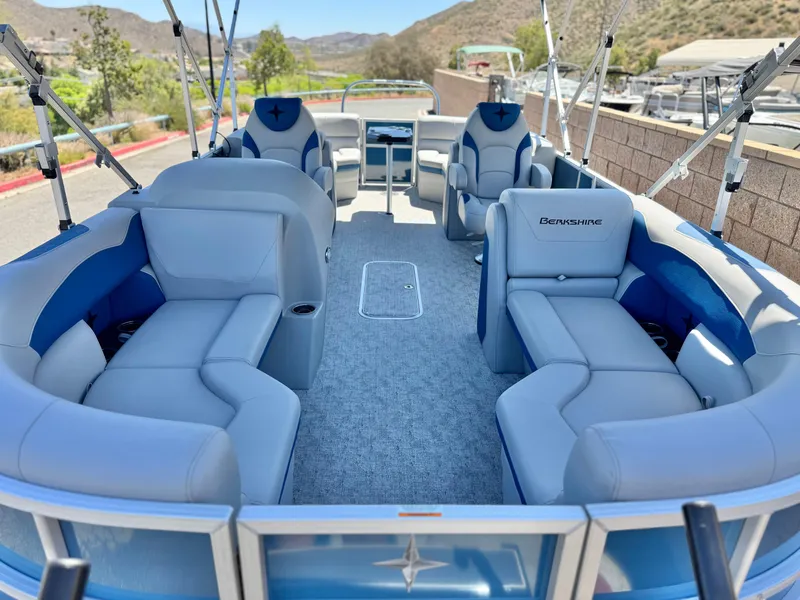 Slide: The Image of 2025 Berkshire 22RFX LE pontoon boat with spacious seating and modern design. - 7