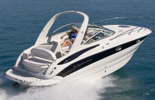Slide: The Image of 2008 Crownline 270 CR boat cruising on open water, showcasing sleek design and performance. - 25