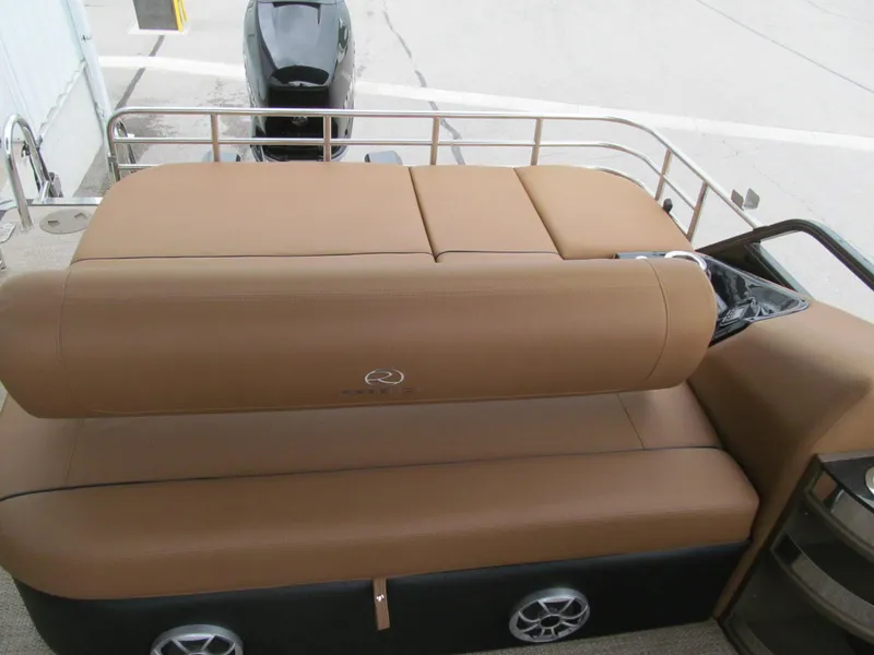 Slide: The Image of 2022 Regency 250 LE3 Sport boat with tan seating and sleek design. - 18