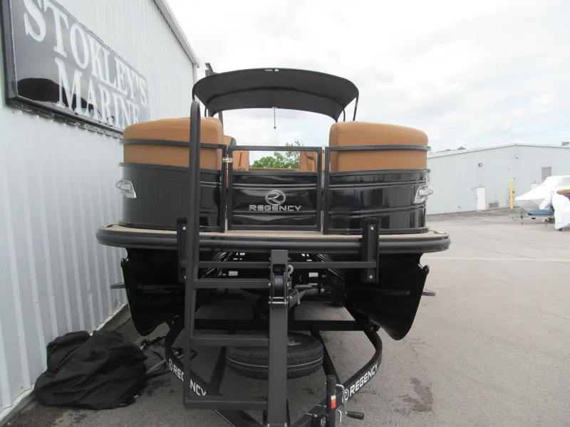 Slide: The Image of 2022 Regency 250 LE3 Sport pontoon boat on trailer at Stokley's Marine. - 5