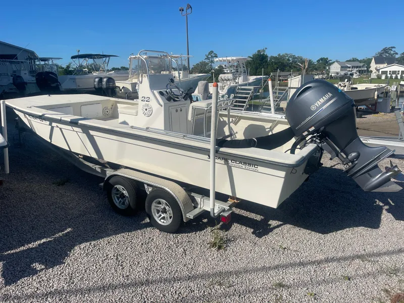 Slide: The Image of 2018 May-Craft 22 Cape Classic boat with Yamaha outboard motor on a trailer. - 3