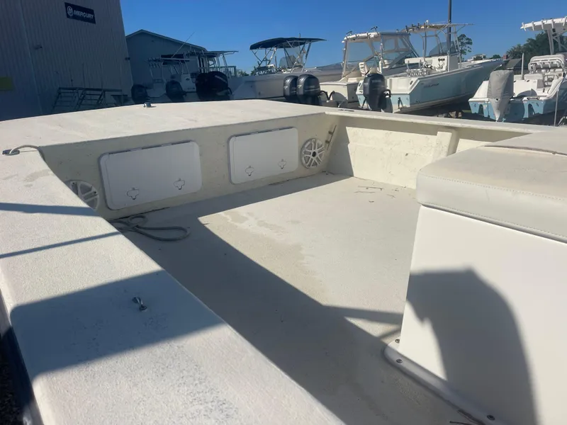 Slide: The Image of 2018 May-Craft 22 Cape Classic boat interior with seating and storage compartments. - 5