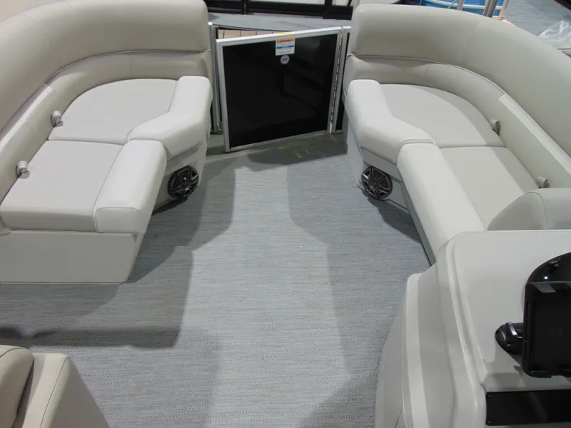 Slide: The Image of Interior of 2025 Godfrey EX 1680 CX pontoon boat with plush seating and modern design. - 6
