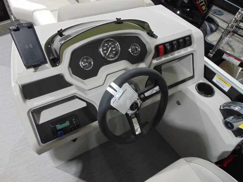Slide: The Image of Dashboard of 2025 Godfrey EX 1680 CX boat with steering wheel and control panel. - 7