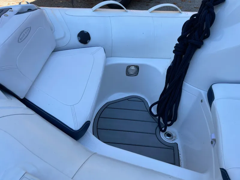 Slide: The Image of 2022 Zodiac Yachtline 360 interior with white seating and black rope. - 11