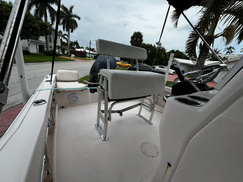 Slide: The Image of 2013 Grady-White Fisherman 180 boat interior with seating and steering console. - 31