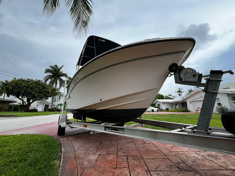 Slide: The Image of 2013 Grady-White Fisherman 180 boat on trailer, parked in residential driveway. - 6