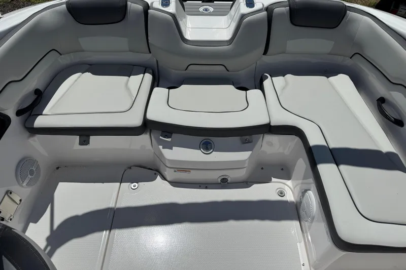 Slide: The Image of 2025 Yamaha Boats SX190 interior seating with sleek, modern design and comfortable cushions. - 13